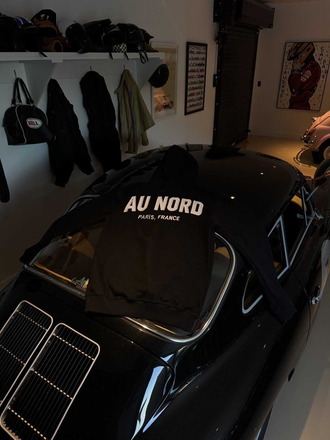 au nord hoodie — draped over the black 356 in the garage